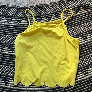 Yellow “daisy” shirt .